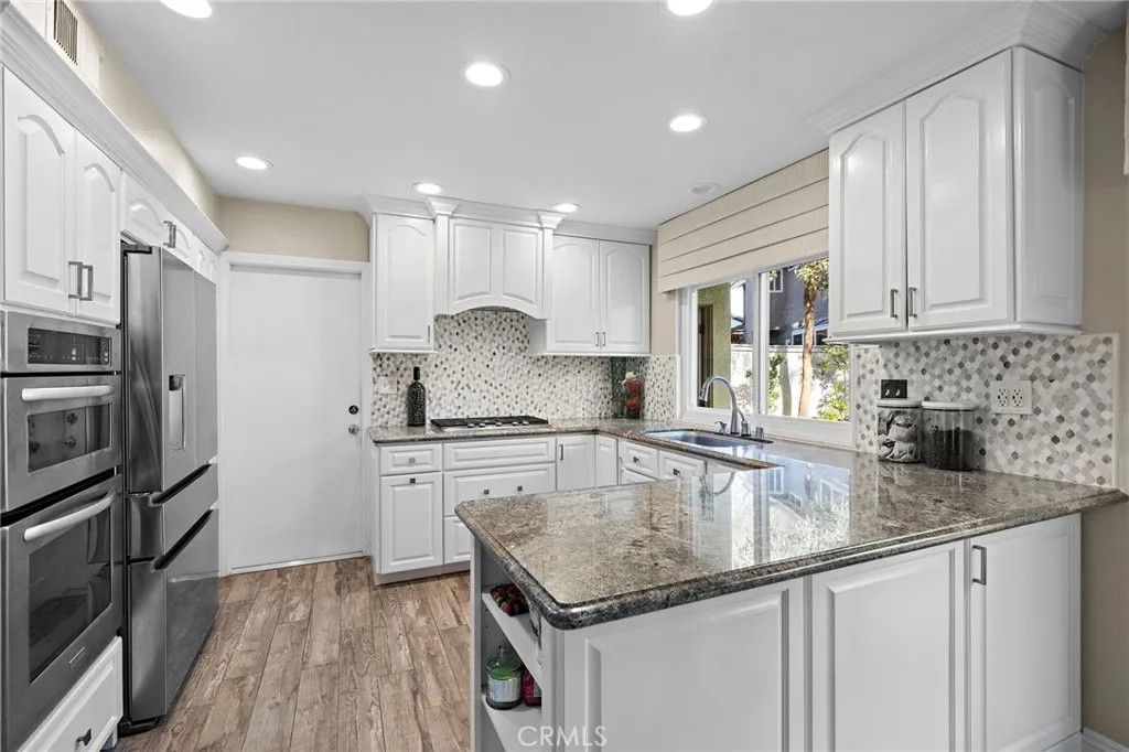 Photo of 12 Blue Heron Lane, Aliso Viejo, CA 92656 (MLS # LG26012995)