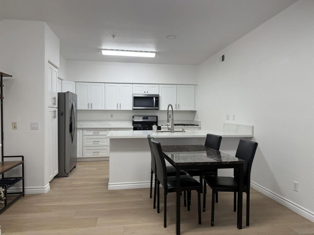 Photo of 12360 Carmel Country Rd #B202, San Diego, CA 92130 (MLS # 250041507)