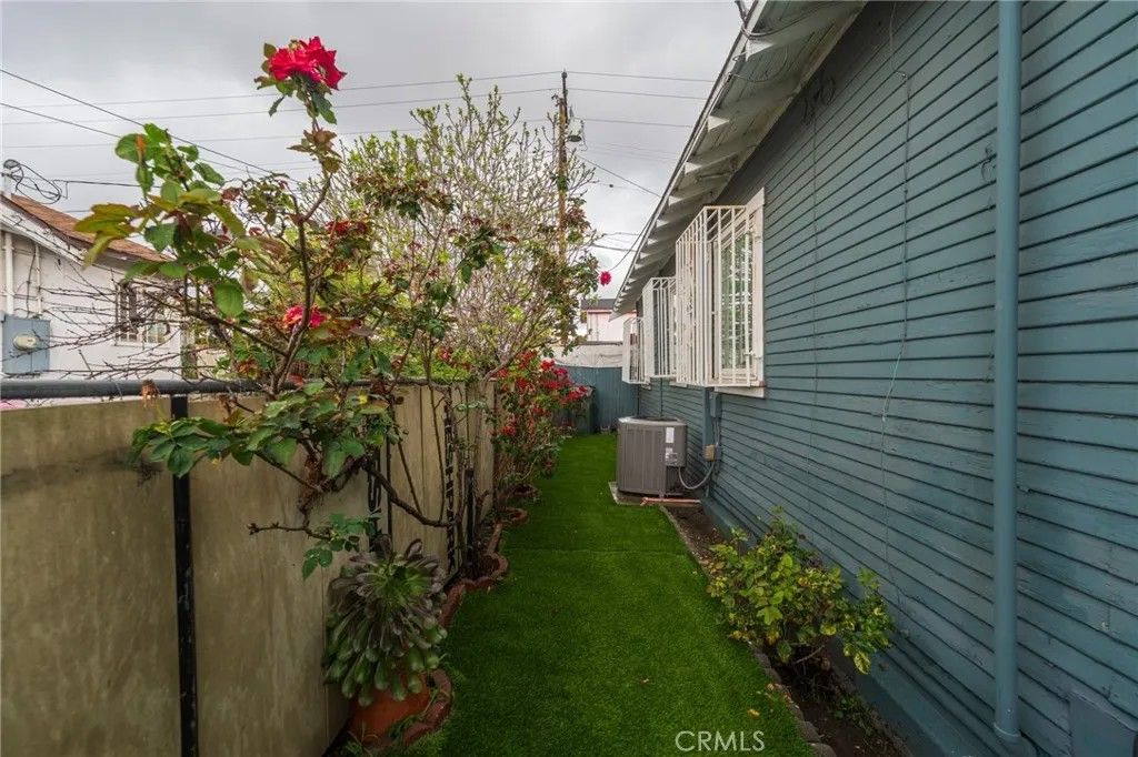 Photo of 1219 W 98th St, Los Angeles, CA 90044 (MLS # OC26036380)