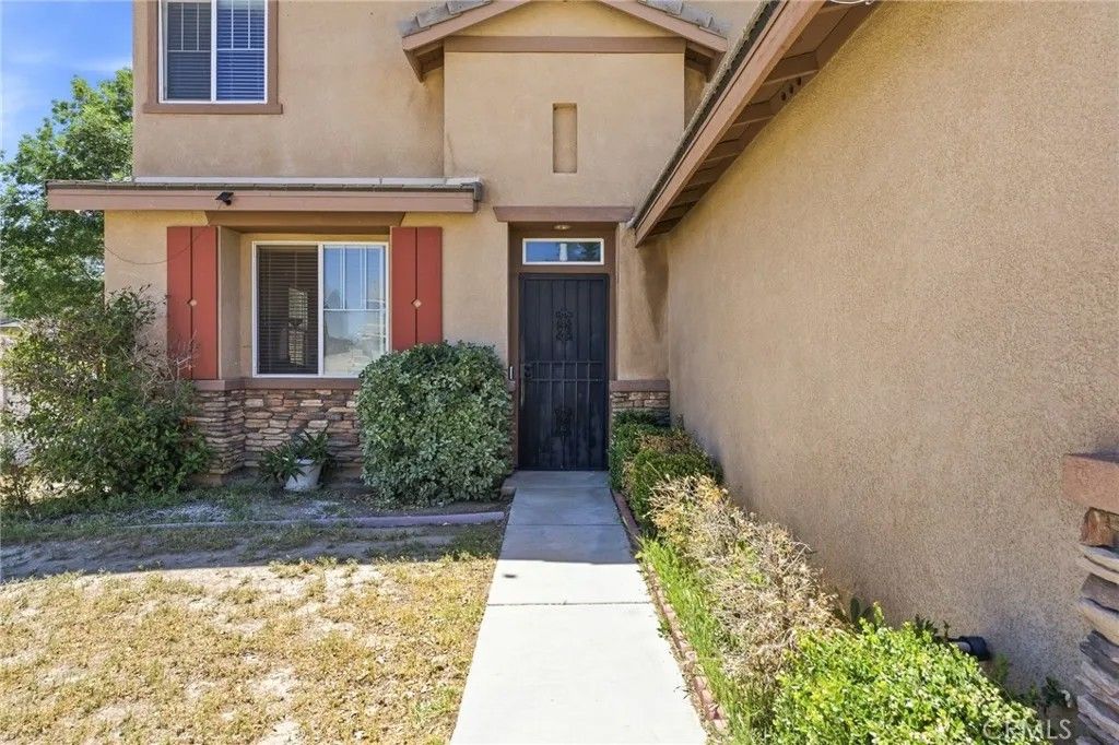 Photo of 12419 Ojo Caliente St, Victorville, CA 92392 (MLS # CV26083016)