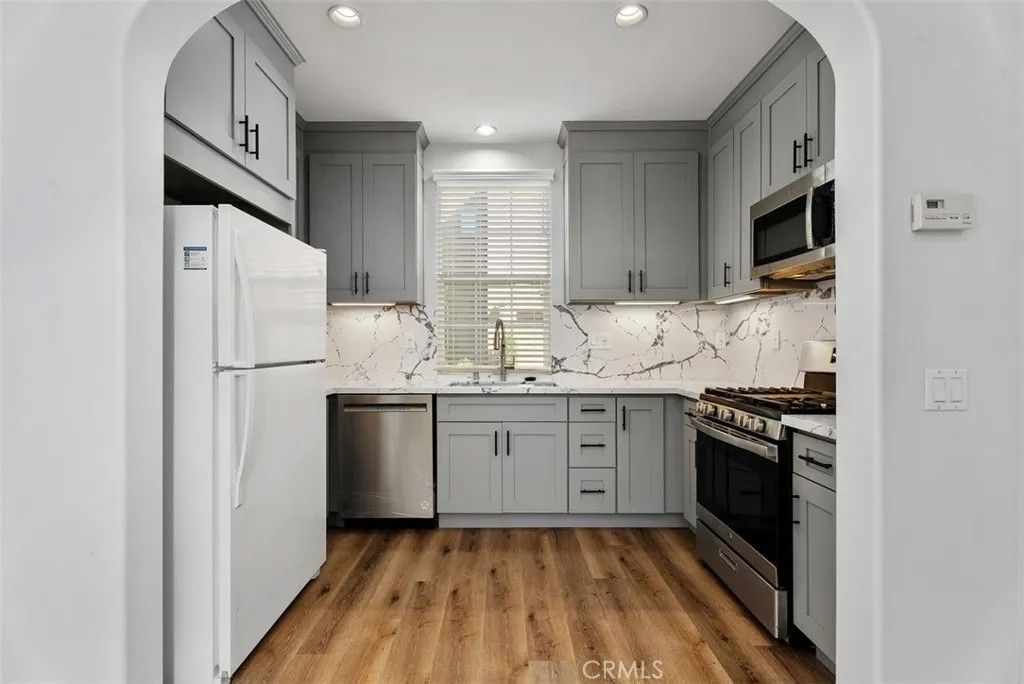 Photo of 48 Windchime, Irvine, CA 92603 (MLS # OC26062650)