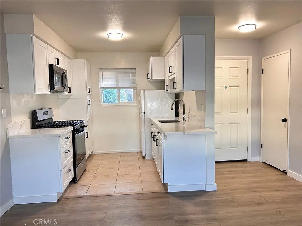 Photo of 7010 Jordan Ave #8, Canoga Park, CA 91303 (MLS # SR26084137)