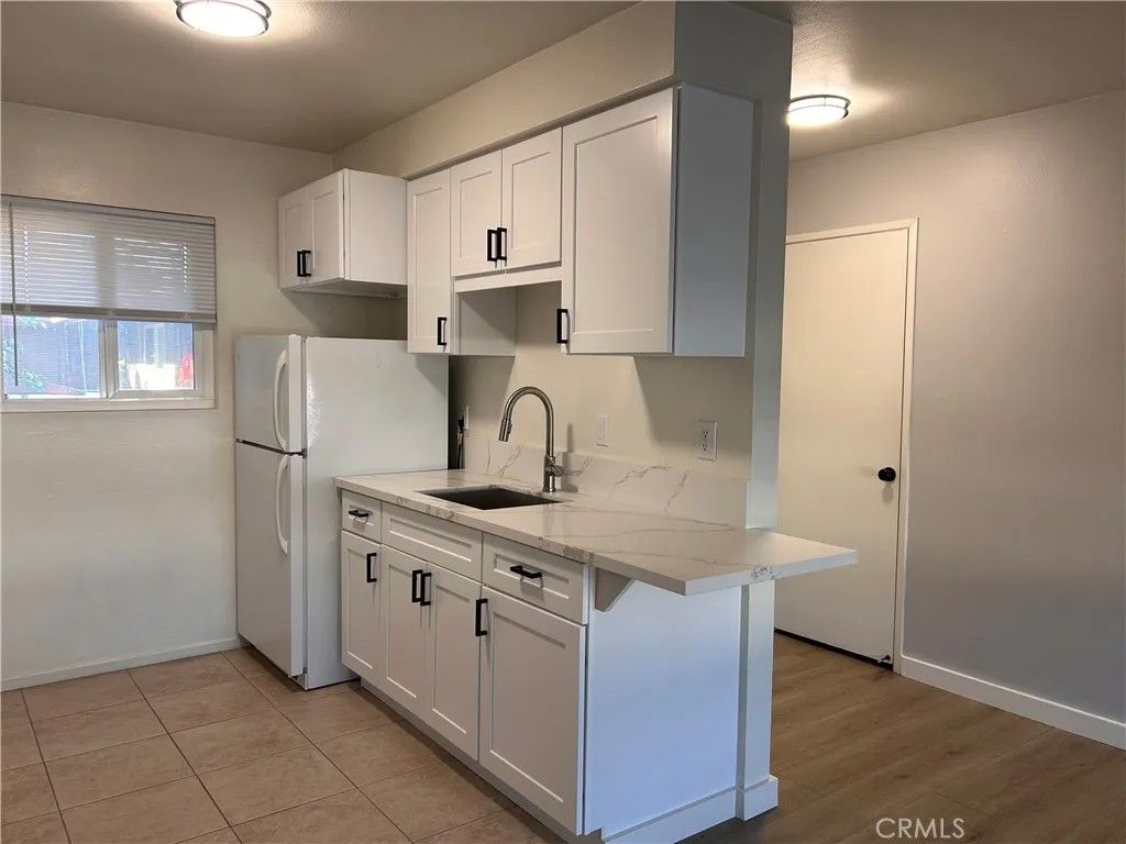 Photo of 7010 Jordan Ave #8, Canoga Park, CA 91303 (MLS # SR26084137)