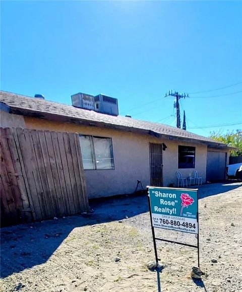 Photo of 49437 Pioneer Dr, Morongo Valley, CA 92256 (MLS # JT25245435)