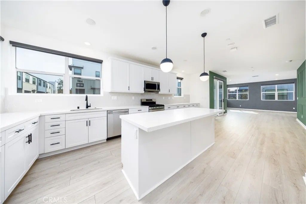 Photo of 967 N Divino Privado #13, Ontario, CA 91764 (MLS # TR26021821)