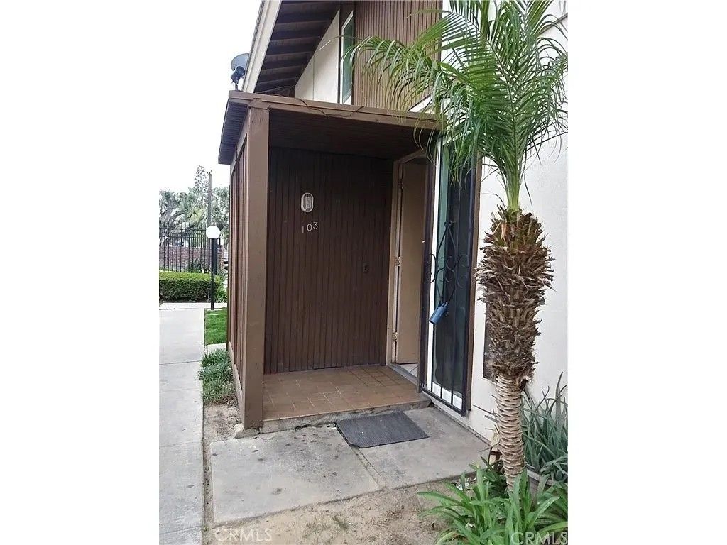 Photo of 15500 Tustin Village #103, Tustin, CA 92780 (MLS # CV26061886)