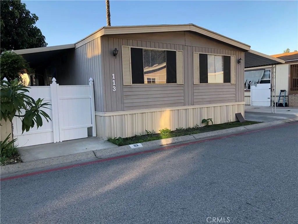 Photo of 4901 Green River #113, Corona, CA 92878 (MLS # PW25266614)