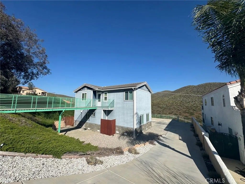 Photo of 22164 Vacation Drive, Canyon Lake, CA 92587 (MLS # IV26029450)