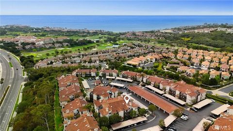 Photo of 28 Corniche Dr #J, Dana Point, CA 92673 (MLS # OC26073018)