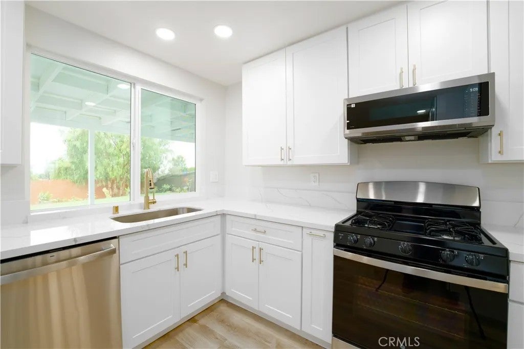 Photo of 1758 Manor DR, Vista, CA 92084 (MLS # SW26199344)
