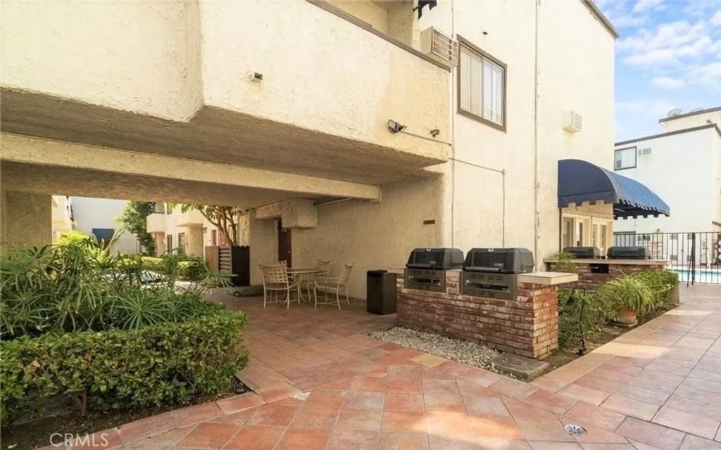 Photo of 18530 Hatteras Street #218, Tarzana, CA 91356 (MLS # BB26047246)