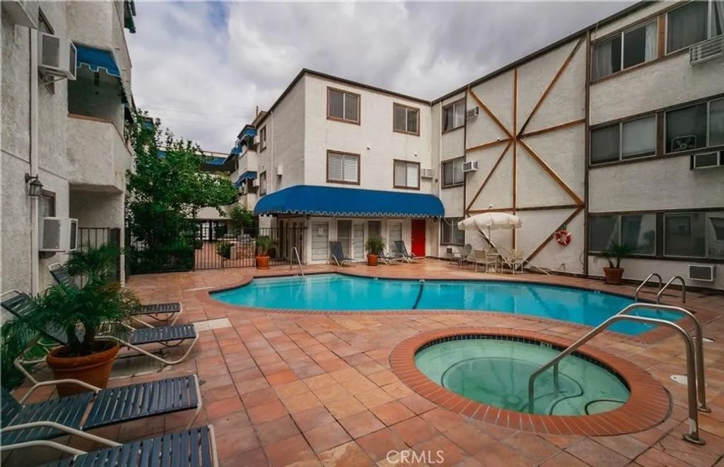 Photo of 18530 Hatteras Street #218, Tarzana, CA 91356 (MLS # BB26047246)