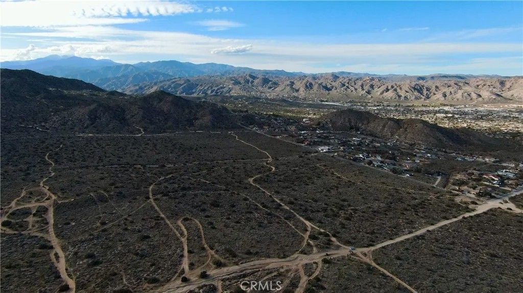 Photo of 56007 Golden Bee Dr, Yucca Valley, CA 92284 (MLS # JT26033327)