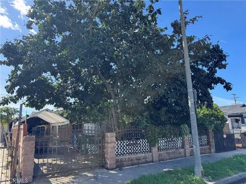 Photo of 1140 W 66th St, Los Angeles, CA 90044 (MLS # DW26036729)