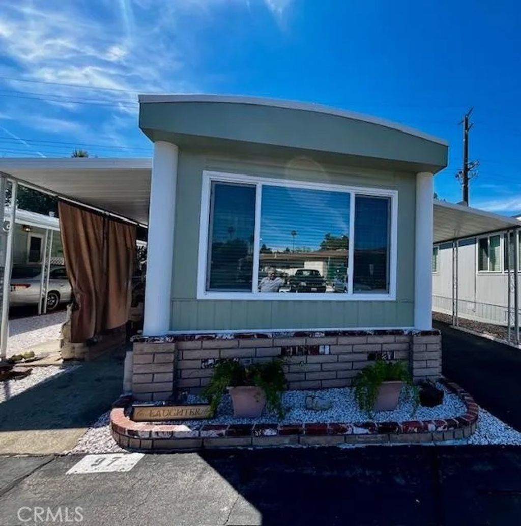 Photo of 801 W Covina Blvd #SPC 97, San Dimas, CA 91773 (MLS # CV26073597)
