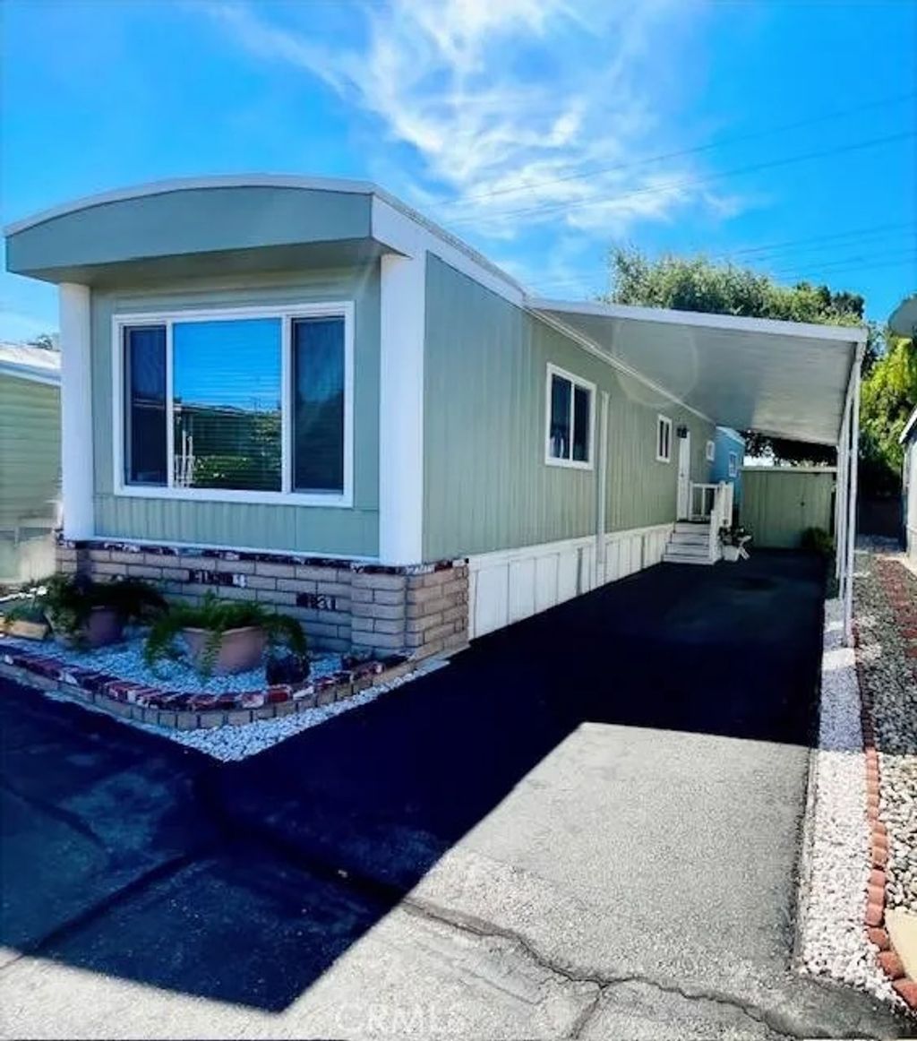 Photo of 801 W Covina Blvd #SPC 97, San Dimas, CA 91773 (MLS # CV26073597)