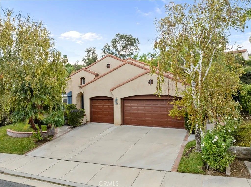 Photo of 25018 Smokewood Way, Stevenson Ranch, CA 91381 (MLS # SR25271602)