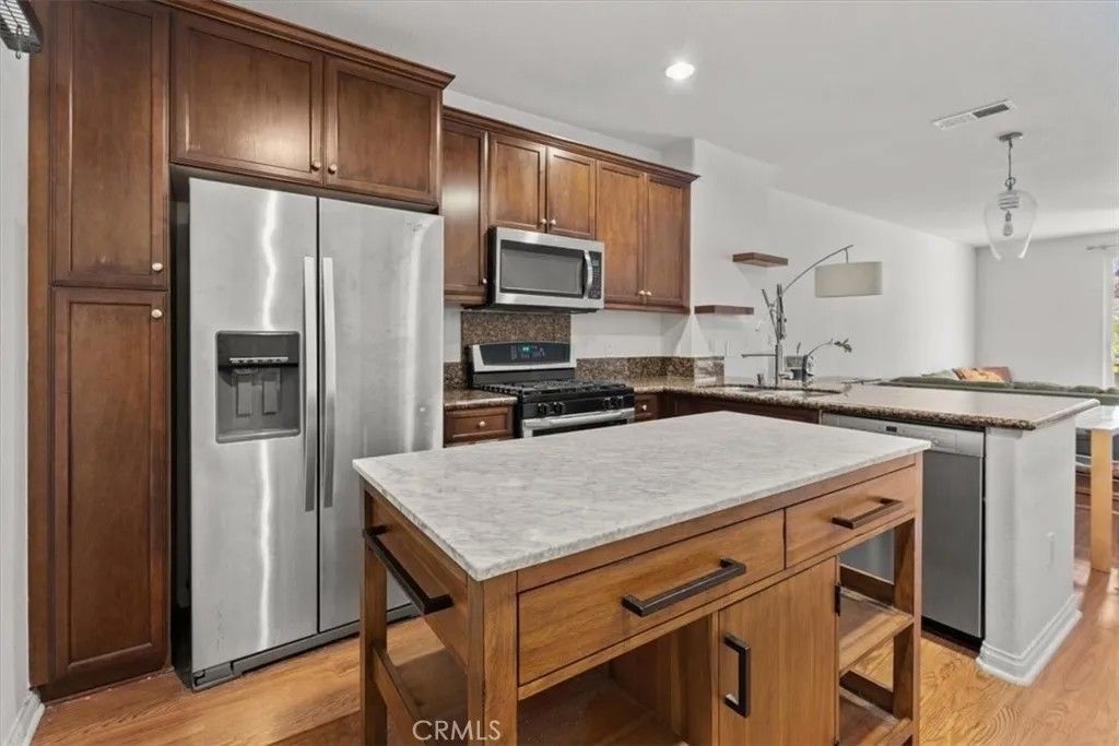 Photo of 8620 Belford Ave #106, Los Angeles, CA 90045 (MLS # SR26041947)