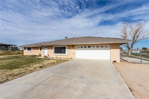 Photo of 13920 Dos Palmas Rd, Victorville, CA 92392 (MLS # HD26028583)