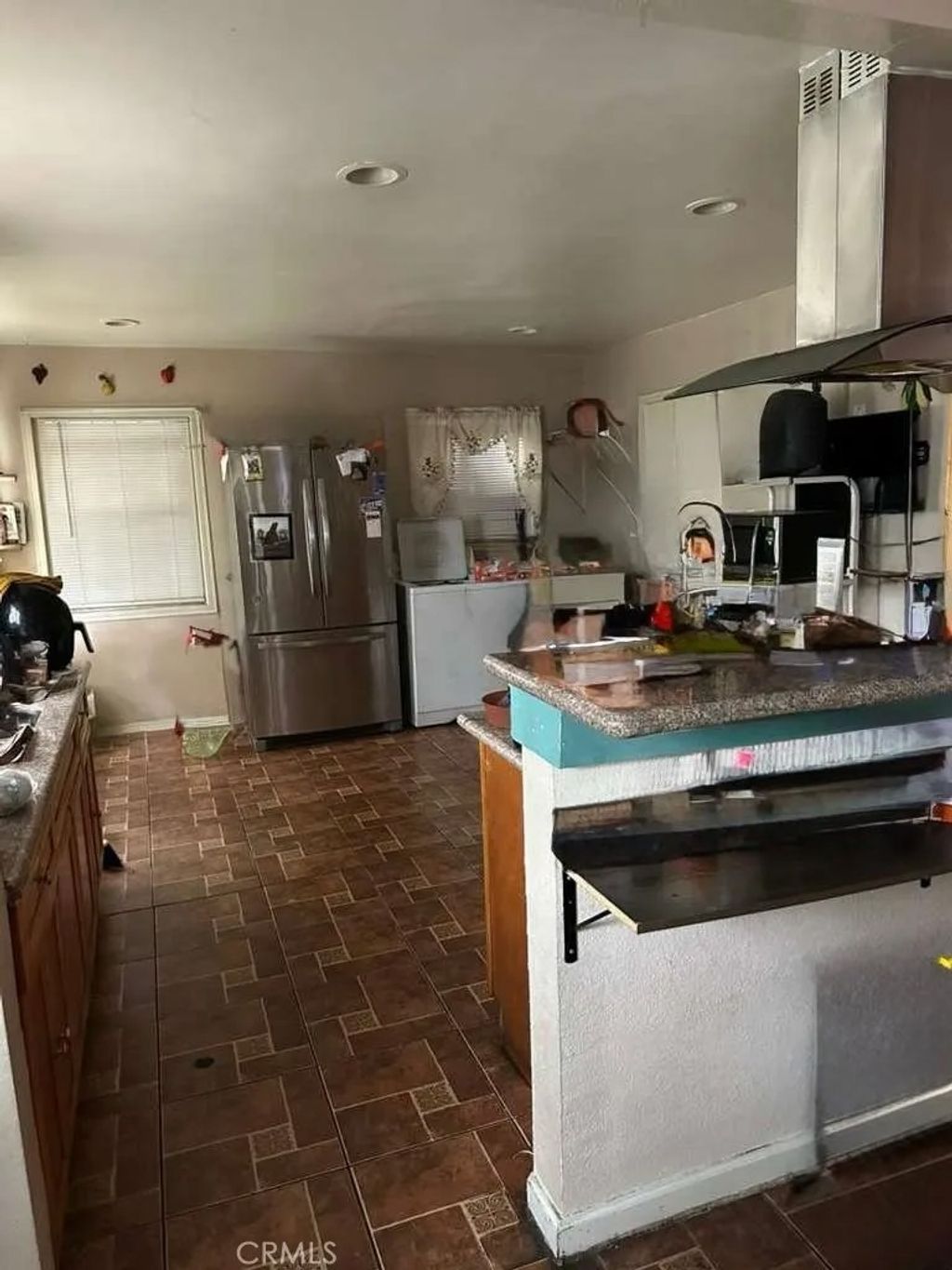 Photo of 10401 State St, South Gate, CA 90280 (MLS # DW25248050)