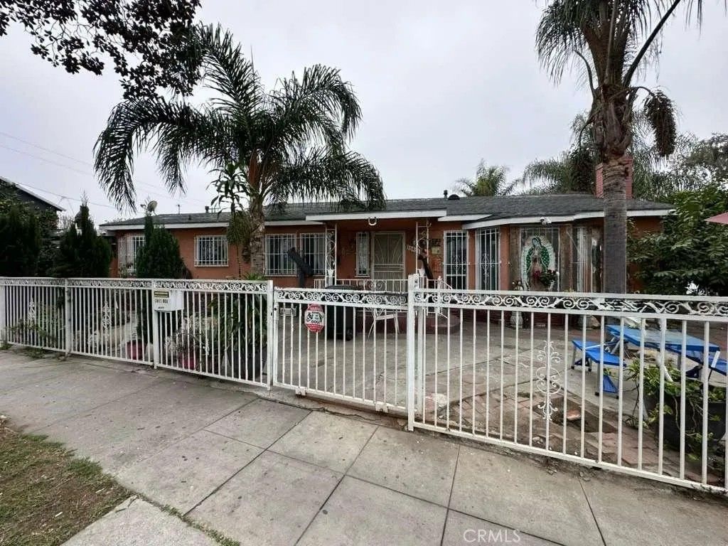 Photo of 10401 State St, South Gate, CA 90280 (MLS # DW25248050)