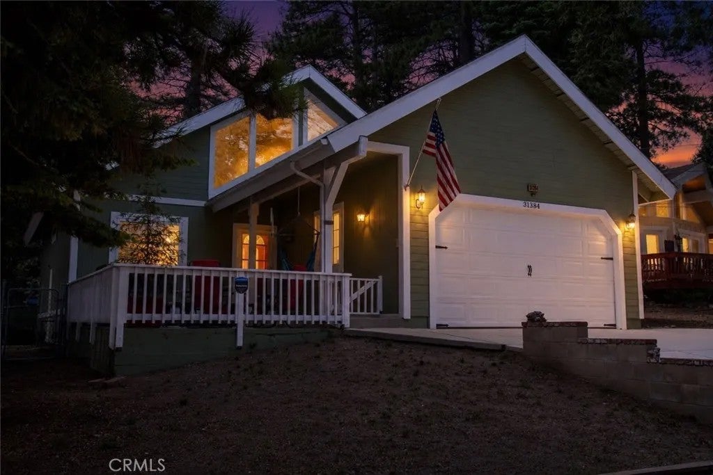 Photo of 31384 Onacrest Dr, Running Springs, CA 92382 (MLS # IG26133163)