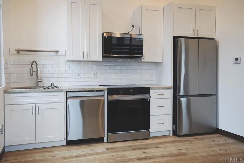 Photo of 5065 Waterview Way #101, Oceanside, CA 92057 (MLS # NDP2602088)