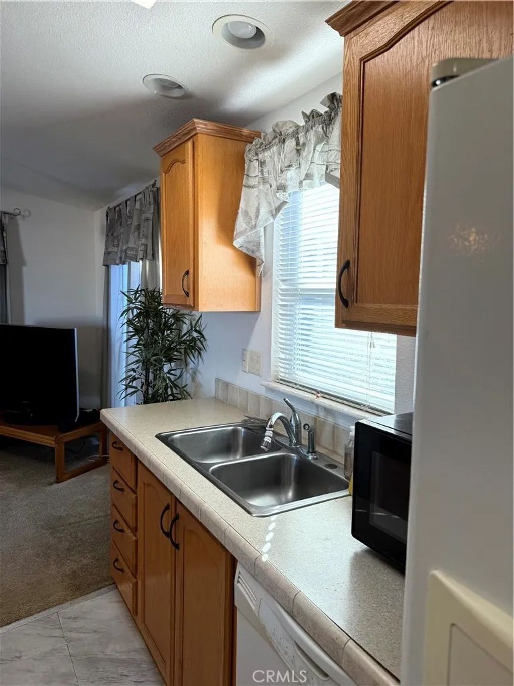 Photo of 1660 Whittier Ave #17, Costa Mesa, CA 92627 (MLS # PW26010477)