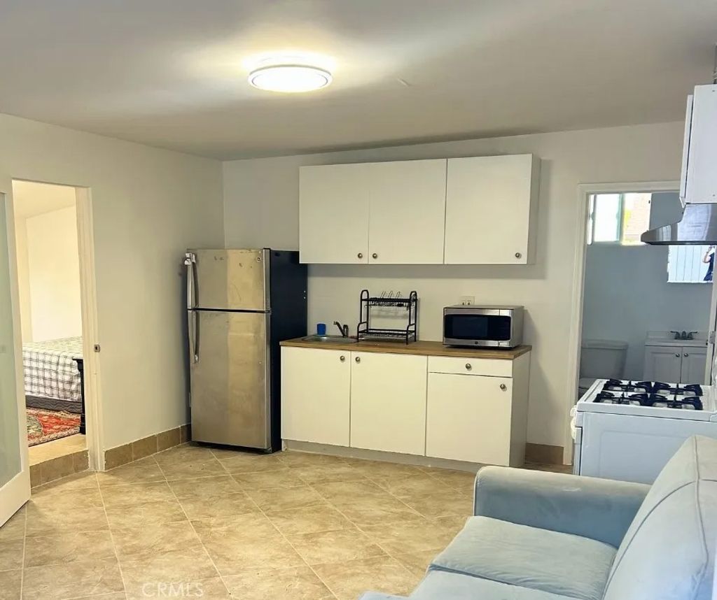 Photo of 7758 Eton Avenue, Canoga Park, CA 91304 (MLS # GD26069992)