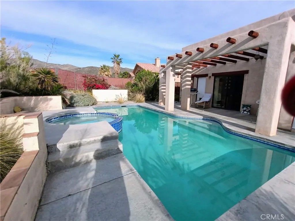 Photo of 10111 Cactus Drive, Desert Hot Springs, CA 92240 (MLS # IG26056051)
