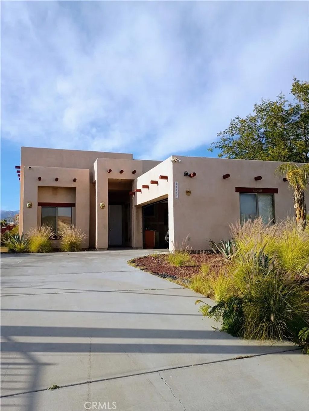 Photo of 10111 Cactus Drive, Desert Hot Springs, CA 92240 (MLS # IG26056051)