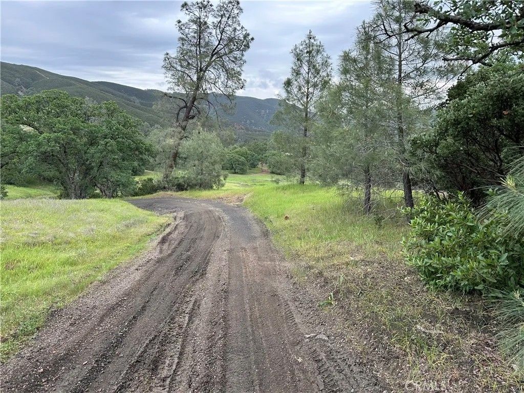 Photo of 666 Watertrough Road, Clearlake Oaks, CA 95423 (MLS # LC26069115)