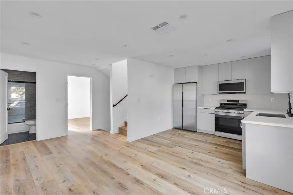 Photo of 1736 Carmona Avenue #A, Los Angeles, CA 90019 (MLS # BB26089575)