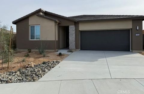 Photo of 74944 Trousdale Drive, Palm Desert, CA 92211 (MLS # OC26016546)