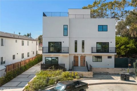 Photo of 2515 Alsace Avenue #1/2, Los Angeles, CA 90016 (MLS # SB26109241)