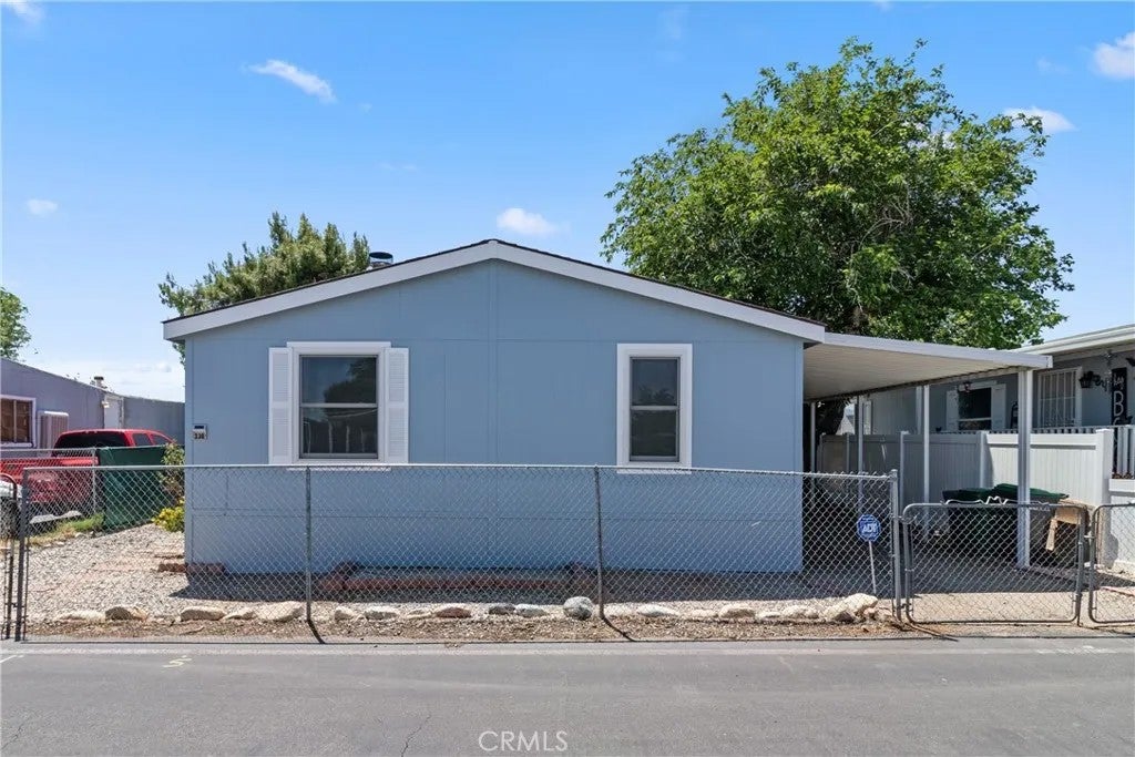 Photo of 3255 E Avenue R #230, Palmdale, CA 93550 (MLS # SR26098979)