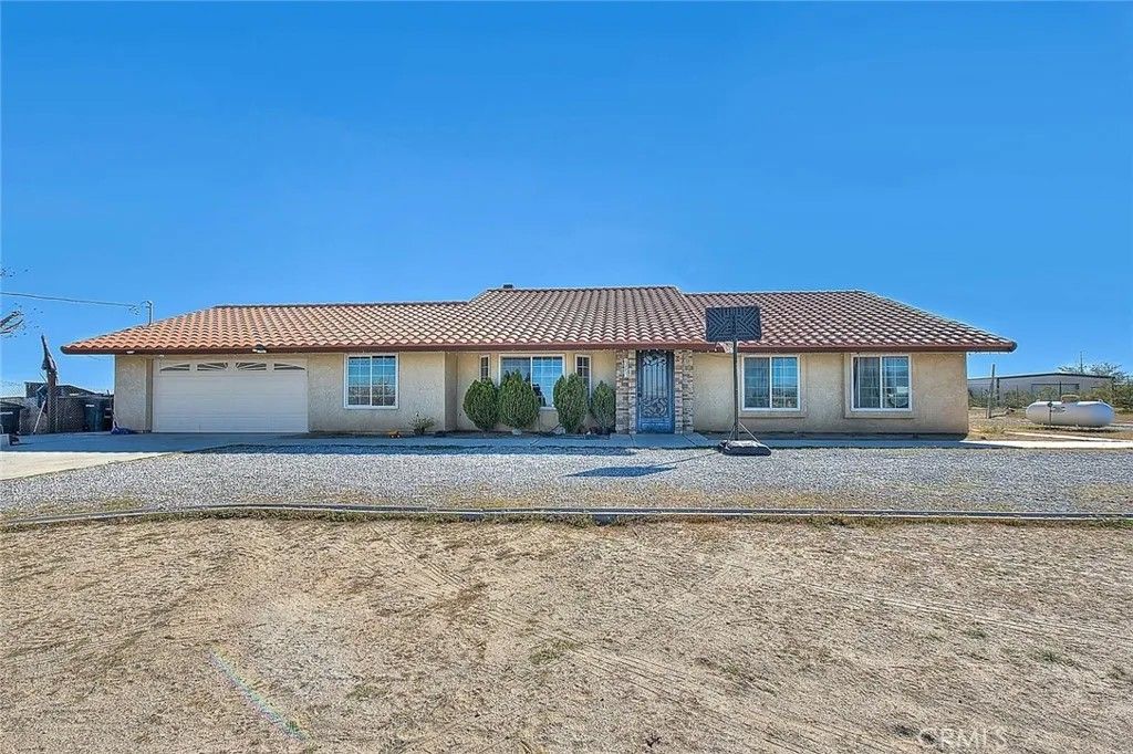 Photo of 13053 Rose Vista Rd, Phelan, CA 92371 (MLS # CV26023838)