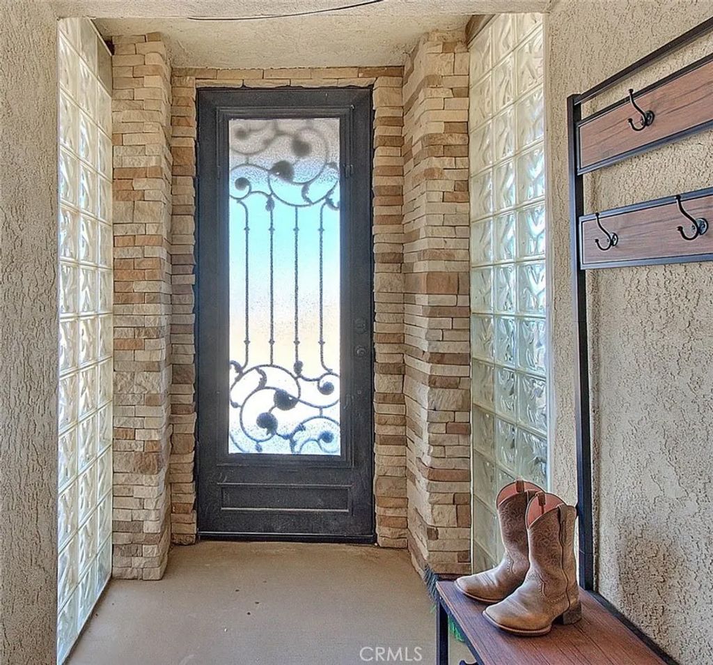 Photo of 13053 Rose Vista Rd, Phelan, CA 92371 (MLS # CV26023838)