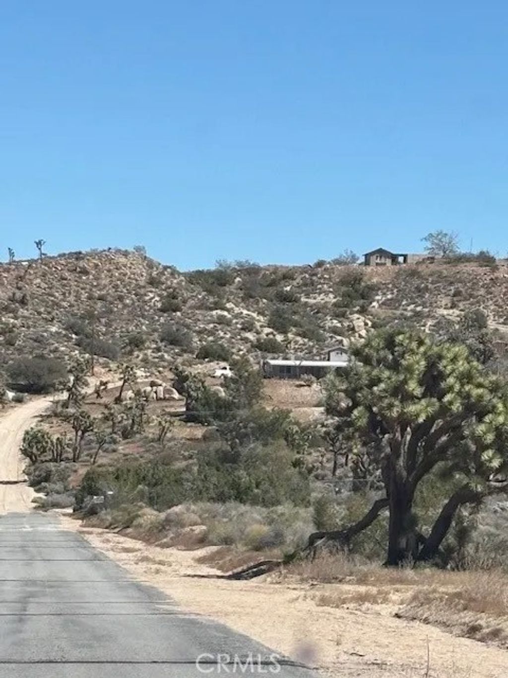Photo of 5437 Davis Way, Yucca Valley, CA 92284 (MLS # HD26063216)