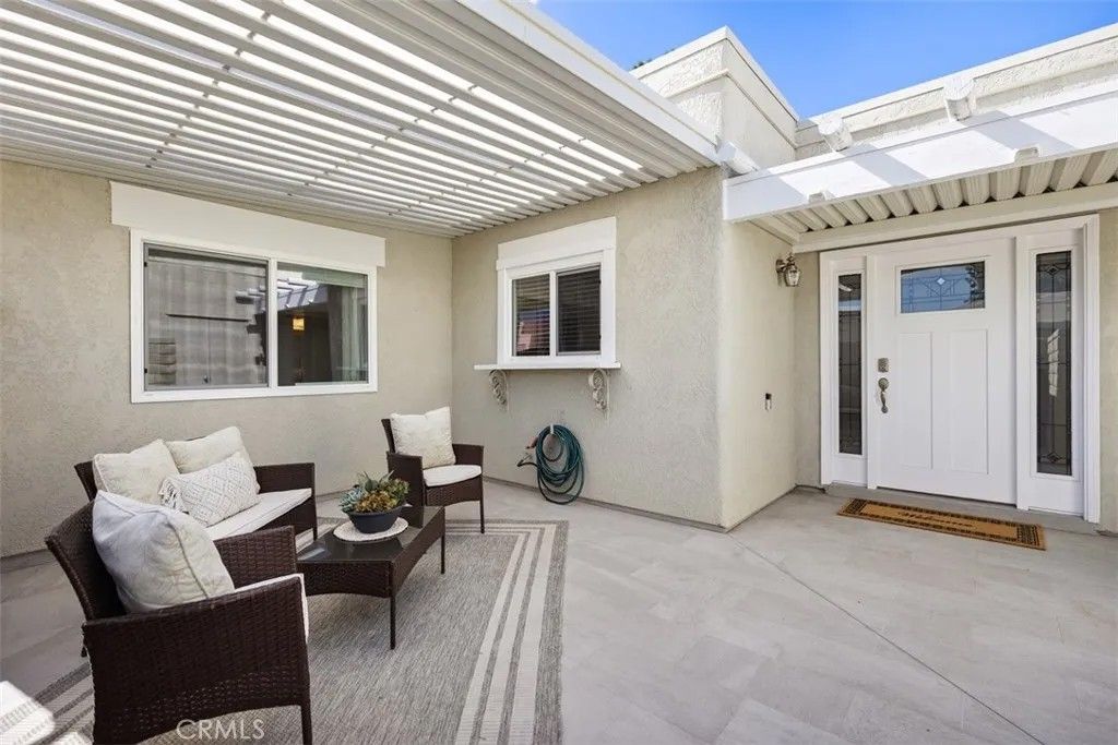Photo of 2263 Via Puerta #D, Laguna Woods, CA 92637 (MLS # OC25247095)