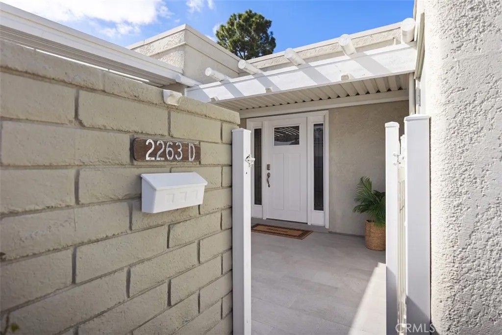 Photo of 2263 Via Puerta #D, Laguna Woods, CA 92637 (MLS # OC25247095)