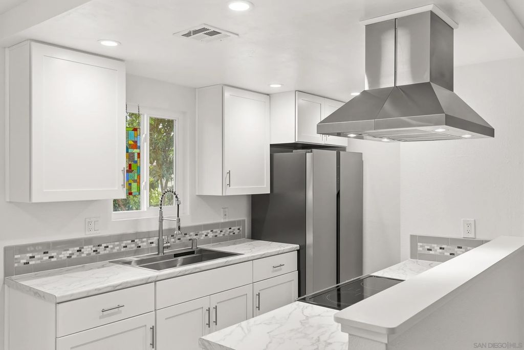 Photo of 9855 Mission Greens Ct #4, Santee, CA 92071 (MLS # 260003498)