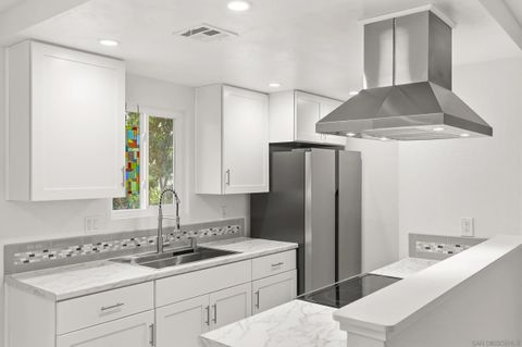 Photo of 9855 Mission Greens Ct #4, Santee, CA 92071 (MLS # 260003498)