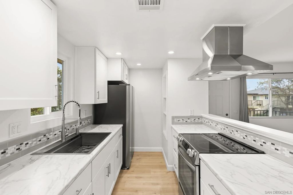 Photo of 9855 Mission Greens Ct #4, Santee, CA 92071 (MLS # 260003498)