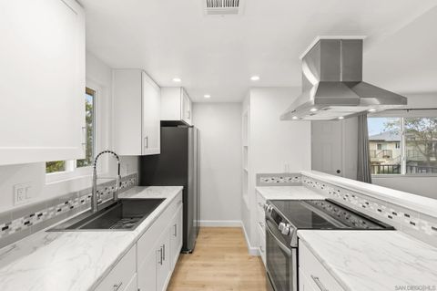 Photo of 9855 Mission Greens Ct #4, Santee, CA 92071 (MLS # 260003498)