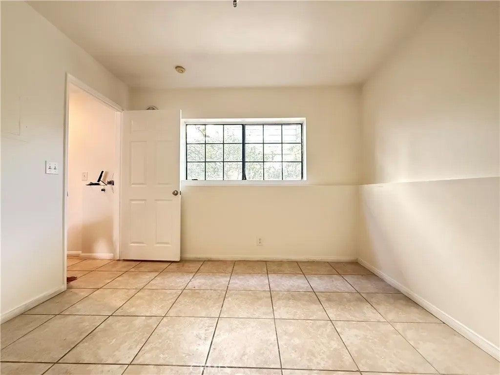 Photo of 13945 Osborne Street #C 104, Arleta, CA 91331 (MLS # SR26194866)