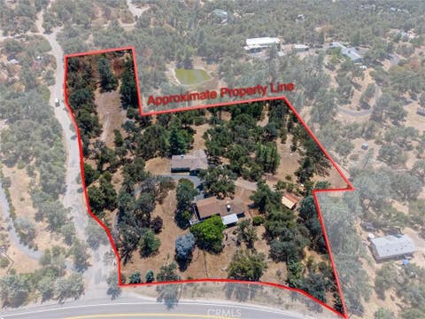 Photo of 43710 Hilltop Ln, Ahwahnee, CA 93601 (MLS # FR26163681)