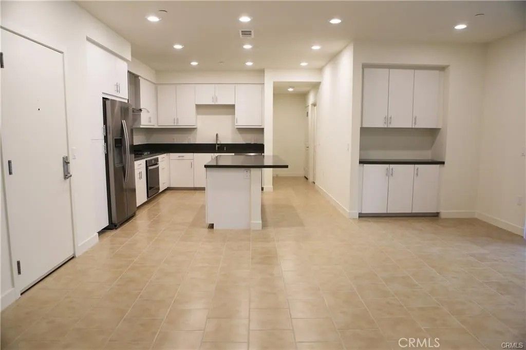 Photo of 1304 Nolita, Irvine, CA 92612 (MLS # RS26095511)