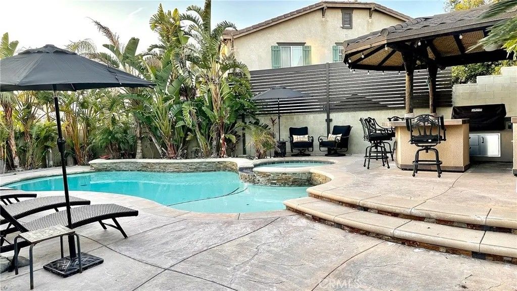 Photo of 6861 earp Way, Fontana, CA 92336 (MLS # IV26096697)