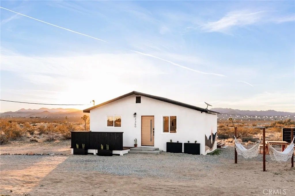 Photo of 2360 Sand Dr, Landers, CA 92285 (MLS # JT26044497)